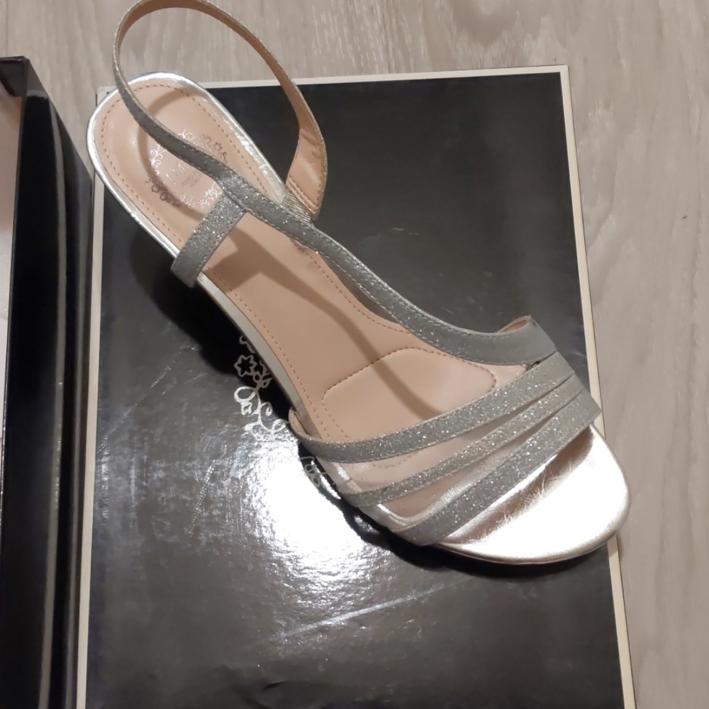 Never worn silver metallic low heels